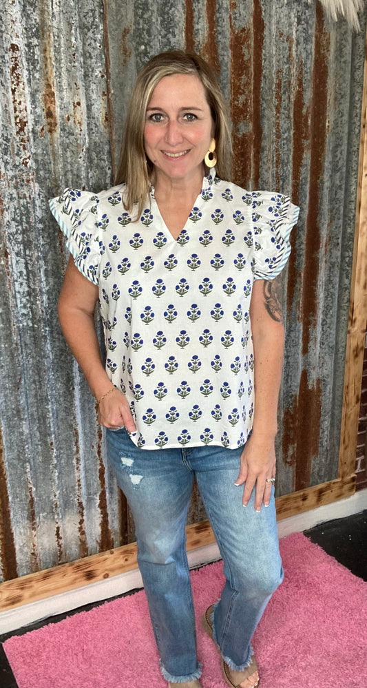 Off White with Blue Top