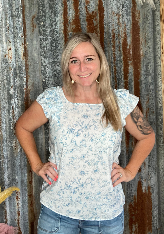 Blue floral top with bow